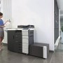 Konica Minolta Bizhub C454 Copier with document feeder finisher large capacity trays in the office