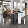 Konica Minolta Bizhub C554 Copier with document feeder finisher large capacity trays in the office