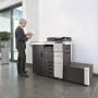 Konica Minolta Bizhub C754 Copier with document feeder finisher large capacity trays in the office